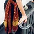 Merino Wool naturally adapts to your body—holding in warmth when it’s cold and letting heat and moisture escape when it’s warm, making it a versatile piece.  Wear it as a head or neck scarf for the winter or strapless top for the summer. 
